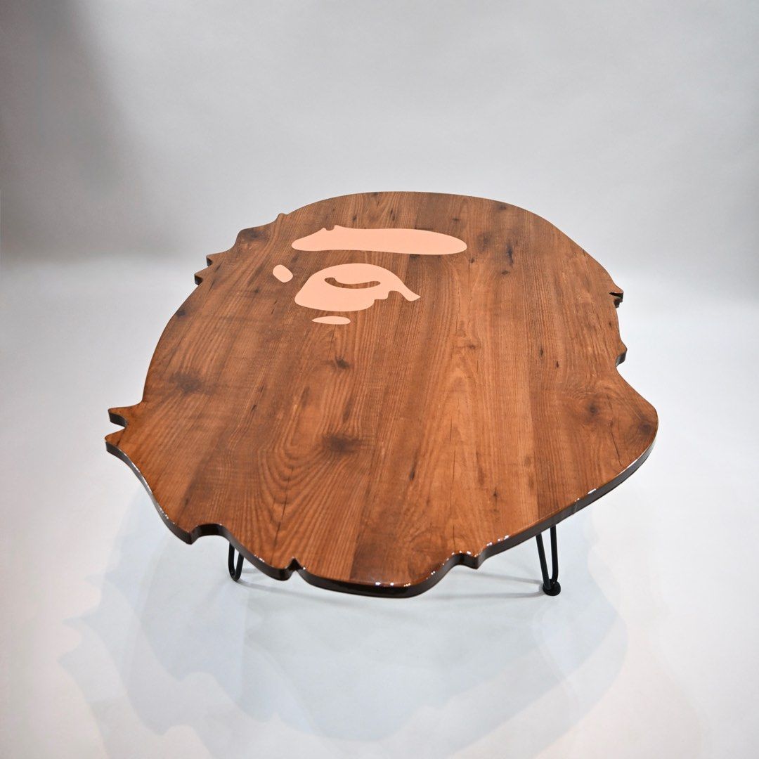 BAPE Inspired Wooden Coffee Table (Category: Tables & Sets) located in Caloocan City. Submitted by kustom.manila (Listing ID 1468412149, Image 3). Description: Featuring a distinctive coffee table from KusTom Unique Objects, Not for All. Featuring an BAPE logo inspired silhouette a warm wood grain finish and sleek black metal legs. MAKE IT YOURS! Interested in this design or looking for a customized piece? Message KusTom to inquire about availabl