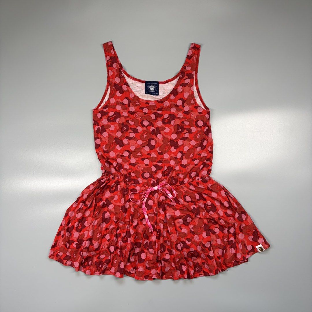 Bape Red Camo Polka dots dress (Authentic) (Category: Activewear) located in Cavite. Submitted by onebeancent (Listing ID 1468427429, Image 2). Description: 🔘CODE 003 Size: Medium to Large (Best in Large Frame Women) Dimension: 17" Width | 29" Length Color: Red Camo Color Rate: 10/10 Issue: Replacement Laced only Condition: Like new‼️ Price: 1,750php Additional Shipping Fee (J&T Small Pouch) 75php Luzon 100php visayas 120php mindanao.