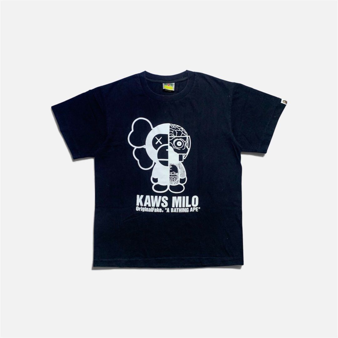 BAPE x ORIGINALFAKE KAWS TEE (Category: Tshirts & Polo Shirts ) located in Cabanatuan. Submitted by _w2keed (Listing ID 1468478383, Image 1). Description: Size: L (W21.5' x L28') Condition: 9.5/10 Color rate: 9.5/10 Issue/s: minimal crack print.