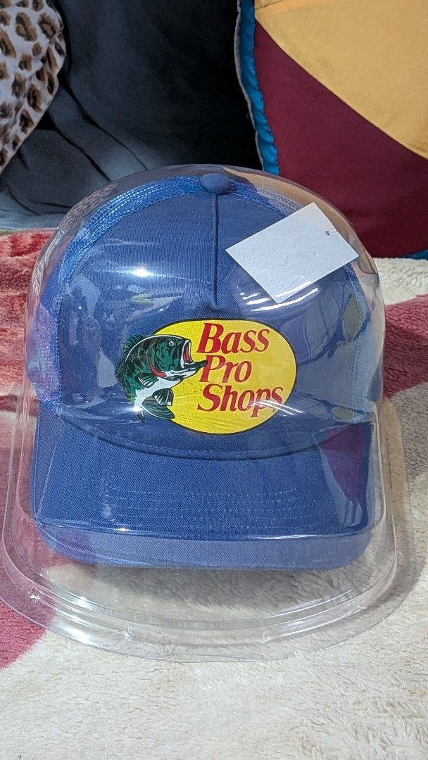 Bass Pro Shops Trucker Hat (Category: Caps & Hats) located in Manila. Submitted by fiasuncion (Listing ID 1468499552, Image 3). Description: Price: Less ₱100 (in total price) if you get both Colors: Bright Blue & Navy Blue Condition: Brand new, imported from the US, with original tags attached and stored in protective plastic casing Design: Screen-printed logo on the front.