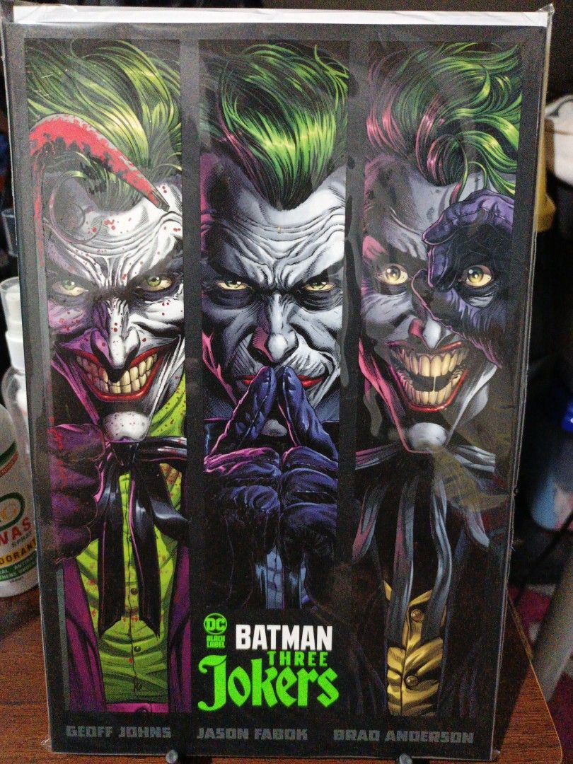 Batman Three Jokers (Category: Comics & Manga) located in Antipolo. Submitted by makasalanan (Listing ID 1468378086, Image 1). Description: - Novel Edition Batman Three Jokers - Bag and Board included - Near Mint / Mint condition.