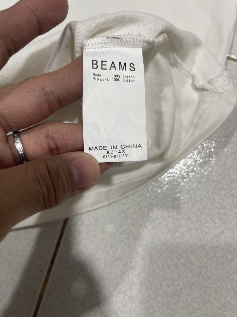 Beams Crewneck Tshirt (Category: Coats, Jackets and Outerwear) located in Mandaue City. Submitted by MJ_80 (Listing ID 1468370068, Image 3). Description: Beams Crewneck Tshirt Medium Dimes: 21.5 X 28 See photos for measurements Issue: may light yellow dot stain on sleeve. See last 2 photos & also front beside beam print Colo rate & Condition: 9.8/10 Price: 1,650 .