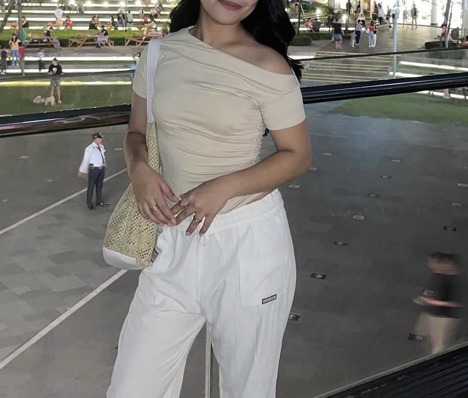 Beige Off-Shoulder Ruched Short Sleeve Top (Category: Blouses) located in Taguig. Submitted by deguzmanke83356 (Listing ID 1468330524, Image 1). Description: - Color: Beige - Style: Asymmetrical off-shoulder neckline with short sleeves - Fit: Fitted with flattering side ruched detailing - Material: Stretchy, super comfortable fabric - Easy to pair with high-waisted jeans or skirts.