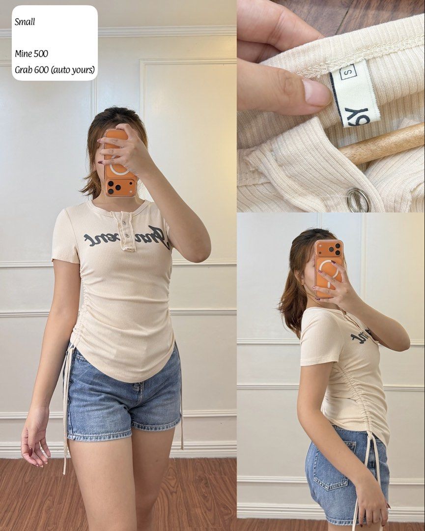 Beige Ribbed Henley Top with Side Drawstrings (Category: Sleeveless) located in Manila. Submitted by angelll0123 (Listing ID 1468430217, Image 1). Description: - Color/Pattern: Beige with printed chest lettering - Size: Small - Details: Henley neckline with button placket & adjustable side drawstrings - Fit: Fitted silhouette - Material: Soft, stretchy fabric.