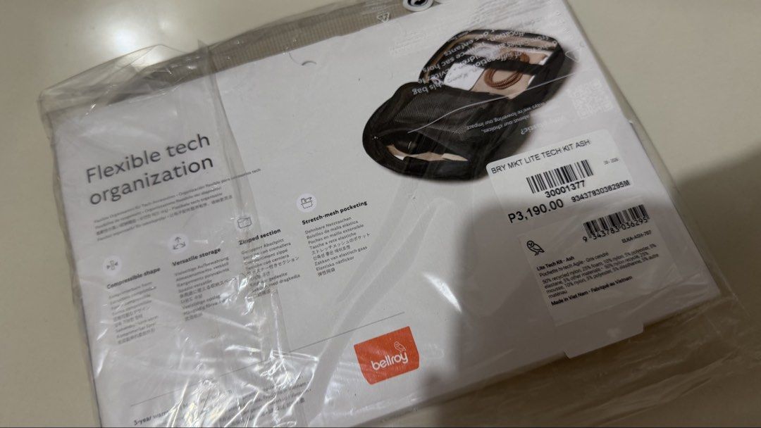 Bellroy Lite Tech Kit Ash (Category: Luxury Bags & Wallets) located in Las Pinas. Submitted by OnlineGadJe (Listing ID 1468292739, Image 2). Description: - Brand: Bellroy - Model: Lite Tech Kit - Color: Ash - Condition: Brand new, still sealed in original plastic packaging - Features: Flexible tech organization, compressible shape, secure zip section, and stretch-mesh pocketing - Material: Sustainable, made from recycled materials - Perfect for: 