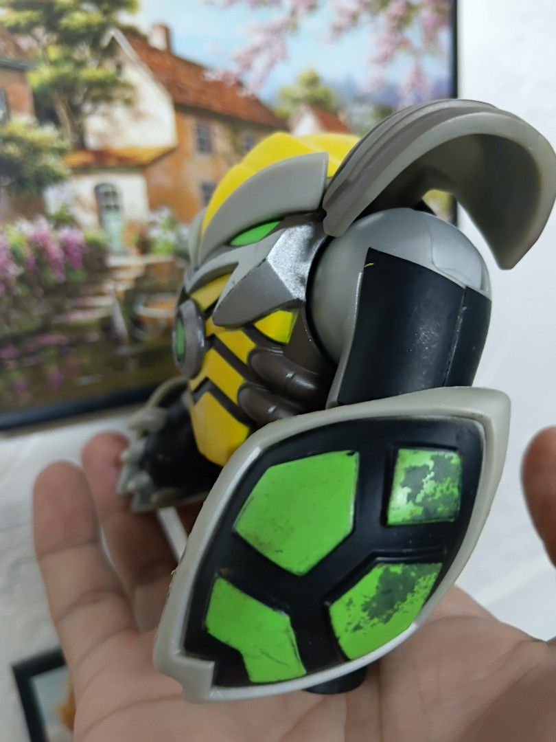 Ben10 Omnikix Cannonbolt Armor (Category: Figurines & Statues) located in Quezon City. Submitted by coffeeyuki56158 (Listing ID 1468315166, Image 2). Description: Ben 10 Omni Kix Cannonbolt Armor authentic playmates toys brand , have some fades sa bandang shield part left and right hands expect from a 2nd hand toys , good posable pa mga arms good for those ito pa yung kulang nyo sa collection nyo ng ben 10 toys qc areas meet ups.