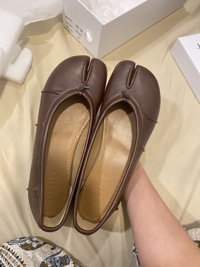 Better Tabi Soft Flats | NEVER WORN (Category: Flats & Sandals) located in Quezon City. Submitted by caf32098 (Listing ID 1468388532, Image 2). Description: Never been used!!! RFS: Pasalubong from Vietnam, sadly it’s 1.5cm too big on me so I have to sell it. Color: Warm brown Size: 6-7 (23.5cm ) Materal: Leather Inclusion: 2 dust bags, shoe box, paperbag, even the cards and shaper complete everything.