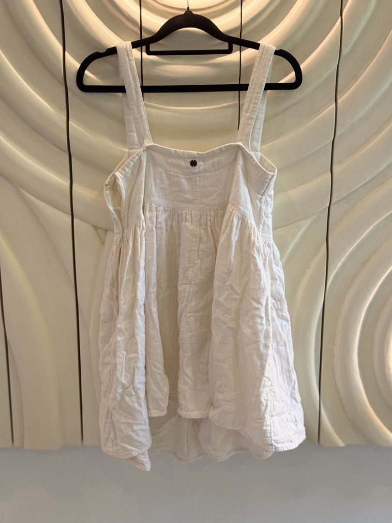 Billabong white linen sundress (Category: Dresses) located in Angeles City. Submitted by adeclutters__ (Listing ID 1468341490, Image 2). Description: - Brand: Billabong - Size: XS - Color: White - Origin: Made in India - Material: Lightweight and breathable - Design: Square neckline, thick straps, pleated bodice, and back button closure - Style: Simple, versatile, perfect for beach days, warm weather, and casual outings Bought at 2000 Selling at 