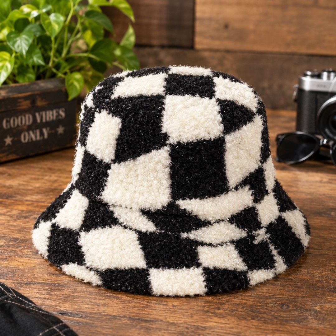Black & White Checkered Fuzzy Bucket Hat (Category: Hats & Beanies) located in Binangonan. Submitted by yuristalin888 (Listing ID 1468287870, Image 2). Description: Add a bold touch to your casual style with this black and white checkered bucket hat. Featuring a soft, fluffy textured fabric, a classic bucket silhouette, and a comfortable black inner lining, it’s a stylish accessory for streetwear, everyday outings, and cool-weather looks..
