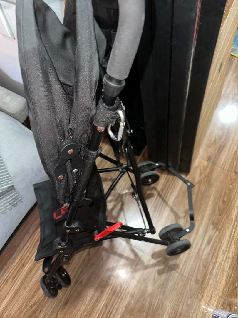 Black and Red Checkered Baby Stroller (Category: Strollers) located in Las Pinas. Submitted by calmwolf_2a8740 (Listing ID 1468452680, Image 3). Description: - Color: Black with stylish red & black checkered pads on harness and headrest - Lightweight and compact design, perfect for travel and daily errands - Easy-fold mechanism for quick storage and effortless car trunk loading - Built-in overhead canopy to keep your little one shaded from the su