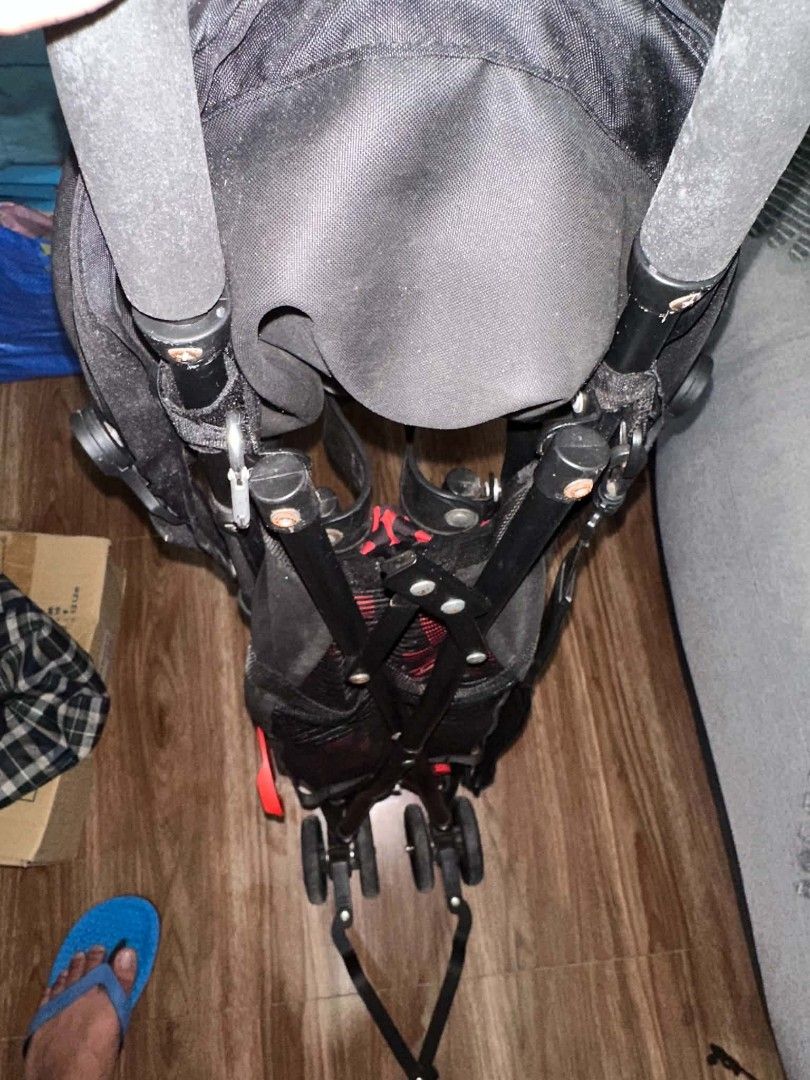 Black and Red Checkered Baby Stroller (Category: Strollers) located in Las Pinas. Submitted by calmwolf_2a8740 (Listing ID 1468452680, Image 2). Description: - Color: Black with stylish red & black checkered pads on harness and headrest - Lightweight and compact design, perfect for travel and daily errands - Easy-fold mechanism for quick storage and effortless car trunk loading - Built-in overhead canopy to keep your little one shaded from the su