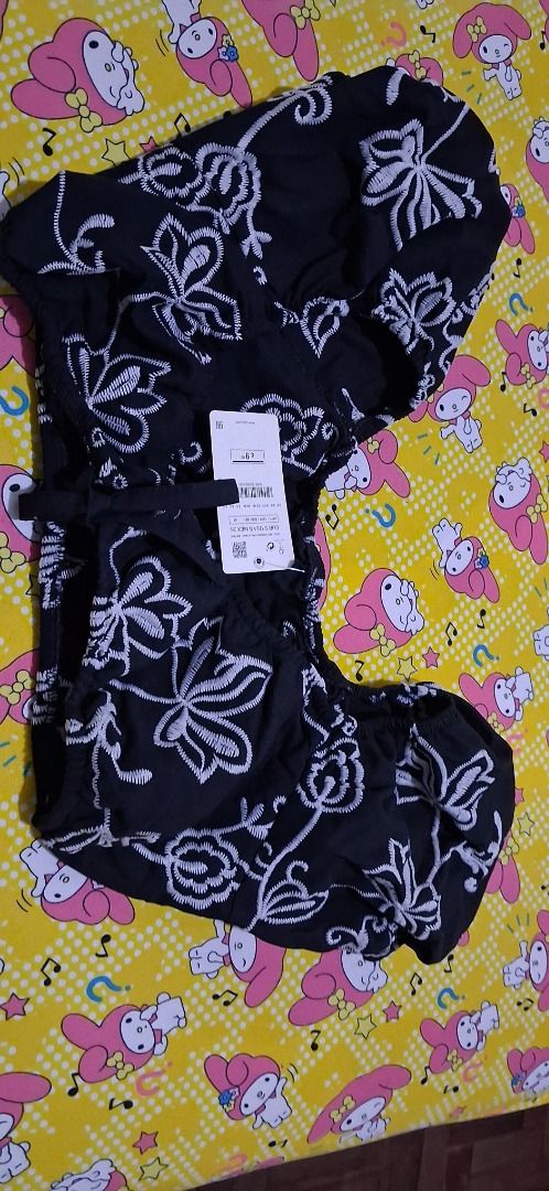 Black and White Floral Print Two Piece Set (Category: Sets or Coordinates) located in Manila. Submitted by katkween23 (Listing ID 1468320538, Image 2). Description: - Style: Matching crop top and shorts set - Design: Black fabric with white embroidered floral pattern - Top: Short puff sleeves - Bottoms: Comfortable elastic waistband - Condition: Brand new with tags (BNWT), never worn.