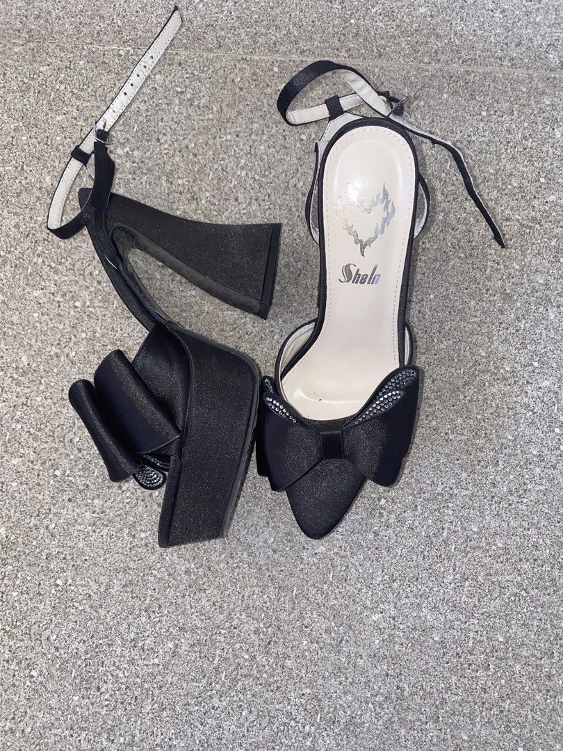 Black Bow Platform Heels Size 37 (Category: Heels) located in Pasay City. Submitted by violetttttttttttttt (Listing ID 1468356352, Image 2). Description: - Style: Platform heels with pointed toes and chunky block heels - Material: Satin-like fabric finish in classic black - Details: Eye-catching rhinestone-studded bow and adjustable ankle straps - Size: 37 - Condition: like new.