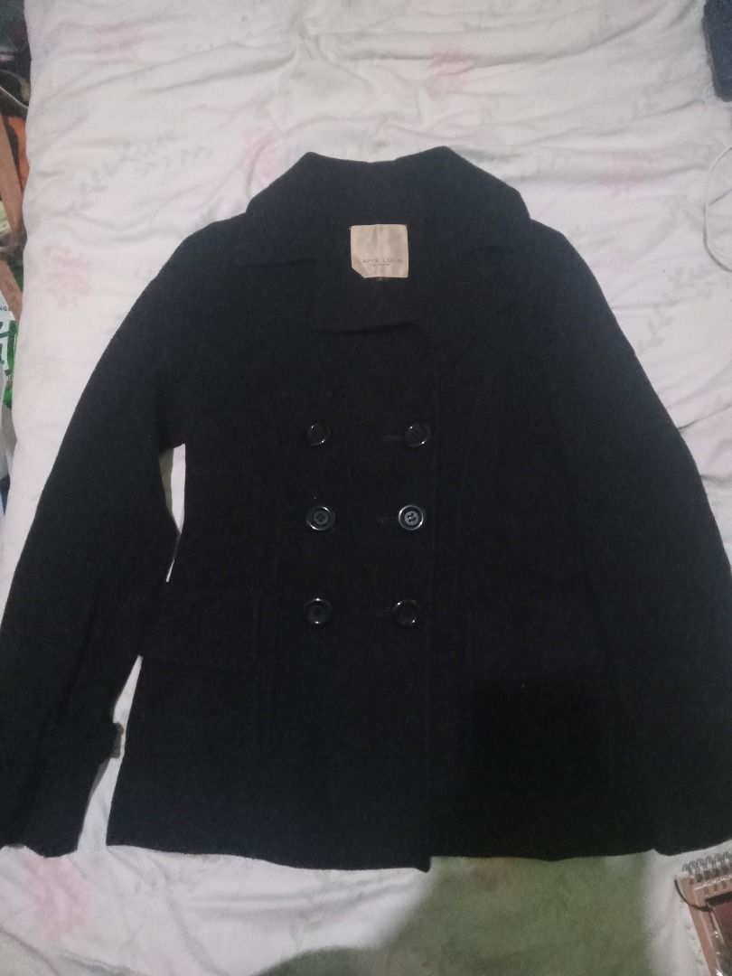 Black Double Breasted Pea Coat (Category: Coats, Jackets and Outerwear) located in La Trinidad. Submitted by roseee.a84fe6 (Listing ID 1468411681, Image 1). Description: - Color: Classic Black - Style: Double-breasted pea coat with notch lapels - Closure: Six dark front buttons - Pockets: Two front flap pockets - Details: Structured shoulders, long sleeves with button tab cuffs - Length: Mid-length cut - Fabric: Heavy textured winter fabric, idea