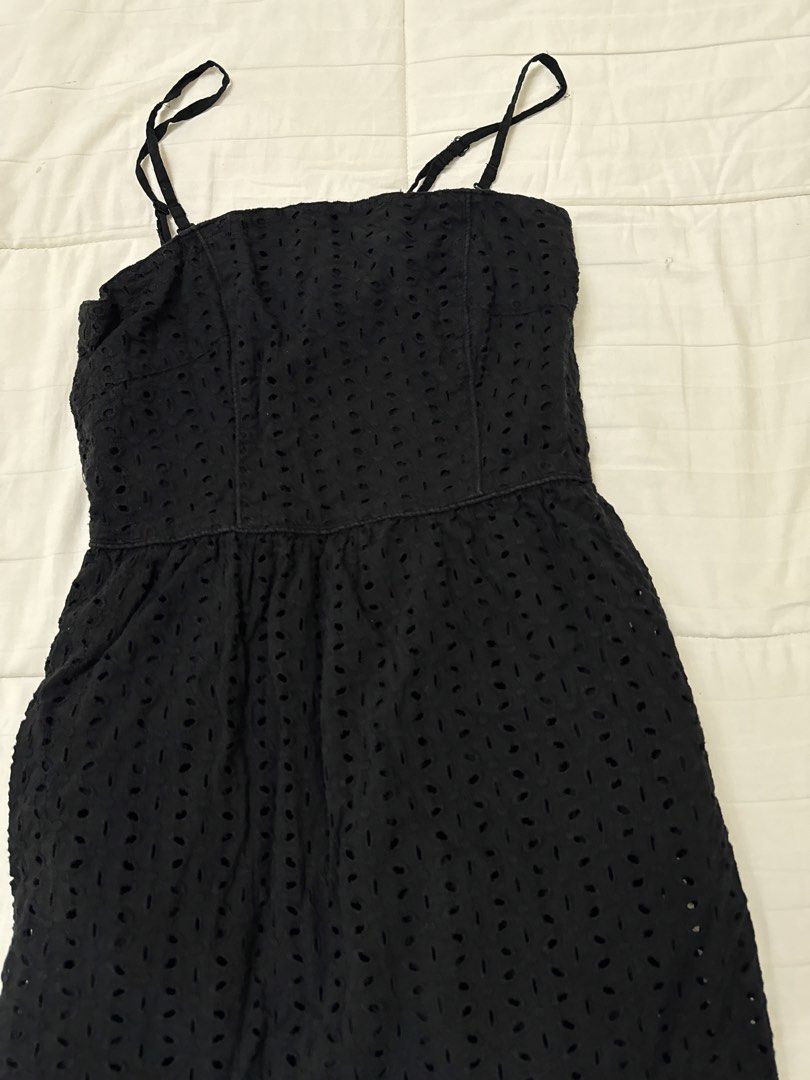 Black Eyelet Sundress with Adjustable Straps (Category: Dresses) located in Quezon City. Submitted by m3gan8 (Listing ID 1468380538, Image 2). Description: - Style: Black eyelet midi dress with a square neckline - Fit: Fitted bodice and slightly flared skirt - Straps: Thin spaghetti straps with metal adjusters - Material: 100% lightweight and breezy cotton - Occasion: Great warm-weather staple piece.