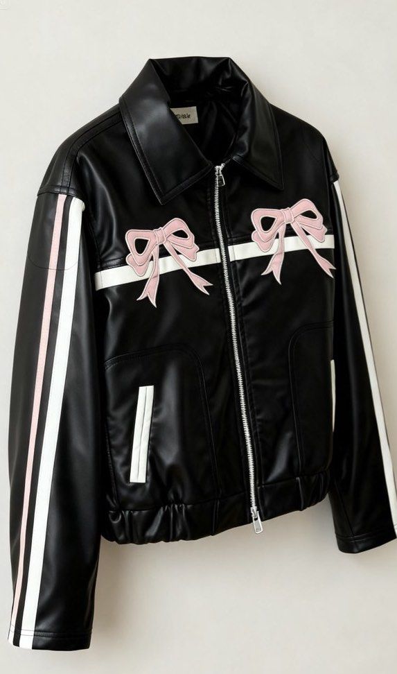 Black Faux Leather Jacket with pink bow (Category: Coats, Jackets and Outerwear) located in Marikina City. Submitted by phelinky_finds (Listing ID 1467536085, Image 2). Description: 🛍️ DESCRIPTION: - Brand: Fudge Rock -Size: from small to medium - Material: Black faux leather (fully lined) - Design details: White piping, pink bow appliqués, and white/pink striped sleeves - Features: Zip-up front, collared neck, two front-trimmed pockets, and sle