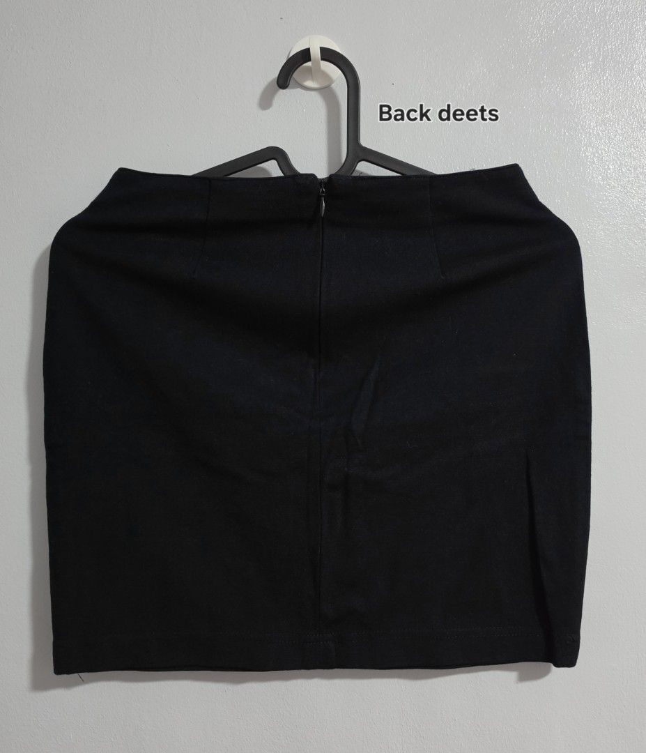 Black mini skirt with back zipper (Category: Skirts) located in Paranaque City. Submitted by franinnashop (Listing ID 1468361033, Image 3). Description: Declutter - Style: Simple black mini skirt with clean front and back design - Closure: Convenient back zipper - Measurements: Waist 24-25 inches, Length 14.5 inches - Color: Neutral solid black, easy to pair with any top - Occasion: Perfect for casual days or going out.