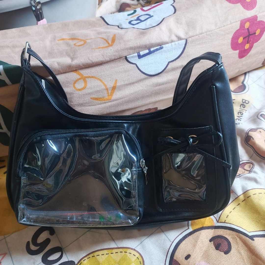 Black PU Leather Small Ita Bag (Category: Shoulder Bags) located in Pateros City. Submitted by taeja-vu (Listing ID 1468332289, Image 2). Description: Material: PU Leather Honest Flaws: Fraying ends on the inner fabric. Factory issue, temporarily resolved with safety pins. Overall condition: 8/10, no scratches or flaws in the zipper or adjustable strap. MOP: Gcash / Maribank (payo! buyer shoulders sf/hf) MOD: Lalamove, J&T, Meetup. .