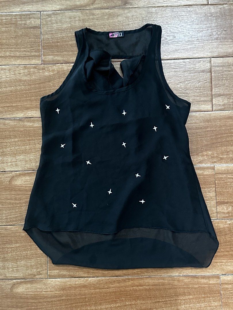 Black Sequin Butterfly Crop Top (Category: Sleeveless) located in Manila. Submitted by purephoenix_1d41df (Listing ID 1468496462, Image 3). Description: - Eye-catching black sequin butterfly halter top - Adjustable tie straps around the neck and back for a flexible fit - Super sparkly in the light – perfect for parties, festivals, and clubbing - Versatile sizing due to adjustable ties.