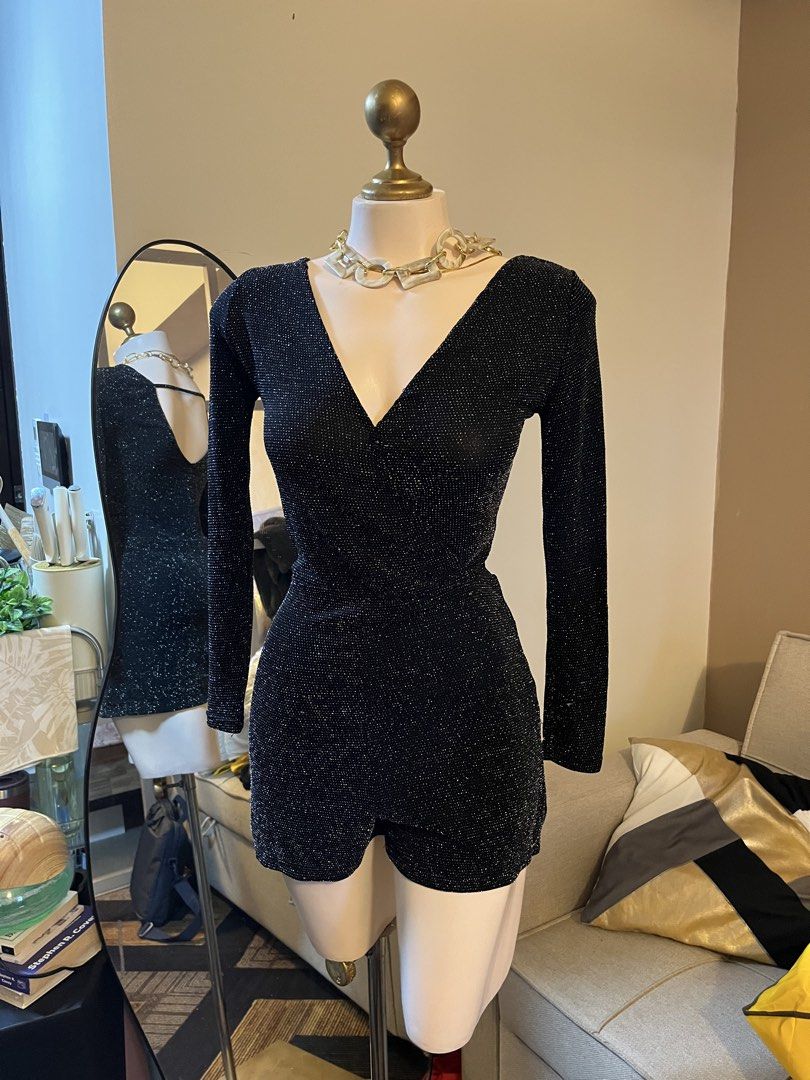 Black sparkly long sleeve wrap romper (Category: Rompers) located in Cebu City. Submitted by harborclothing29 (Listing ID 1468364665, Image 1). Description: Black long sleeve romper with all-over shimmer texture. V-neck wrap front design with fitted shorts. Stretchy fabric, easy to move in. Great piece for parties or night outs..