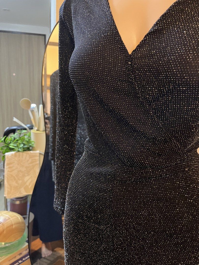 Black sparkly long sleeve wrap romper (Category: Rompers) located in Cebu City. Submitted by harborclothing29 (Listing ID 1468364665, Image 2). Description: Black long sleeve romper with all-over shimmer texture. V-neck wrap front design with fitted shorts. Stretchy fabric, easy to move in. Great piece for parties or night outs..