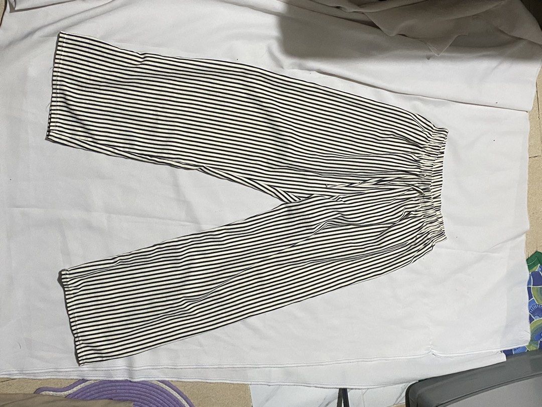 Black Stripes Trousers (Category: Trousers) located in Makati City. Submitted by weirdshopping (Listing ID 1468299322, Image 2). Description: Selling pre-loved clothes! DETAILS: ~ All items are in good condition. - BRANDED - All clothes are sanitized before delivery. ~ Mode of Payment: Cash & Gcash - Available for delivery c/o by costumer: Lalamove, Grab, Angkas ~ Location: Guadalupe Viejo, Makati ~ FOR meet up, pick up, & delivery! (Delivery fee