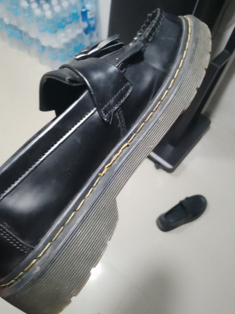 Black Tassel Platform Loafers Chunky Sole (Category: Dress Shoes) located in Manila. Submitted by warmtiger.a2c491 (Listing ID 1468361776, Image 2). Description: - Style: Slip-on platform loafers with tassel and fringe details - Design: Thick chunky sole with iconic yellow welt stitching - Material: Leather upper with standard interior lining - Condition: Normal signs of wear on the soles and leather surface - Origin: Made in China - Versatility: