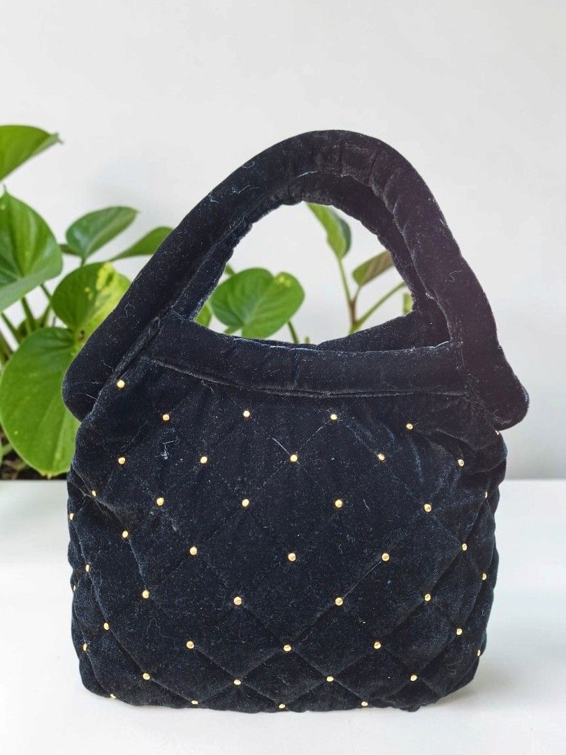 BLACK VELVET STUDDED TOTE BAG (Category: Tote Bags) located in Las Pinas. Submitted by annachiaonair2037 (Listing ID 1468346642, Image 2). Description: BLACK VELVET STUDDED BAG FROM JAPAN WITH MESH DRAWSTRING TO SECURE BELONGINGS MAGNETIC SNAP.CLOSURE LINT ROLLER NYO LANG, NO ISSUE H 9" L 12" W 6.5" Disclaimer: I am not affiliated with, associated with, or authorized by any of the brands featured posted. Any mention of brand names, trademarks, or