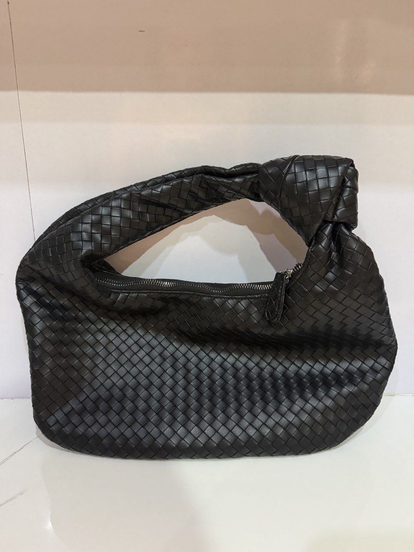 black woven leather shoulder bag (Category: Shoulder Bags) located in Iloilo. Submitted by youngrabbit.b5670d (Listing ID 1468381008, Image 1). Description: Preloved Used once With dust-bag.