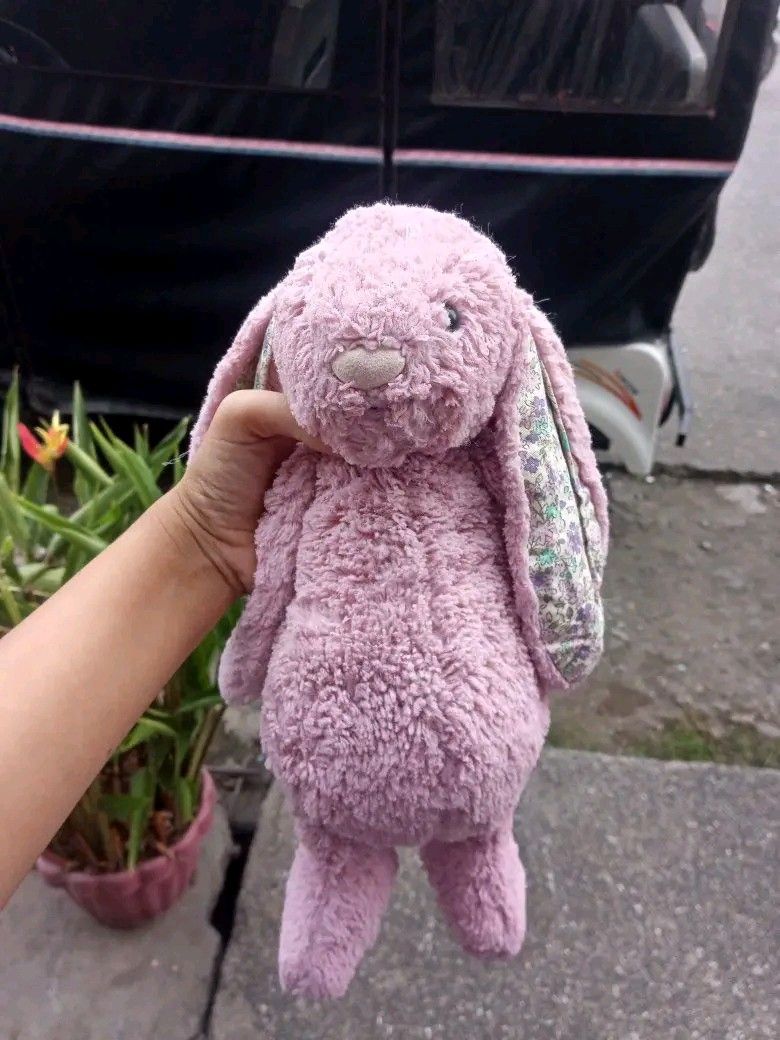 Blossom Jasmine Bunny JELLYCAT (Category: Plushies & Soft Toys) located in Placer. Submitted by whimsythrifts (Listing ID 1468390530, Image 1). Description: - Authentic blossom jasmine jellycat plush bunny in excellent, clean condition - Ultra-soft textured fur with charming floral pattern fabric inside the long floppy ears - Detailed embroidered face with a soft suede nose - Official Jellycat brand tag securely sewn on the back - Well-maintained