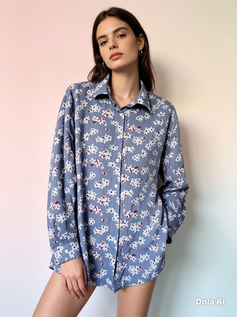 Blue Floral Long Sleeve Button-Down Shirt (Category: Longsleeves) located in Manila. Submitted by f.s_prelov3d (Listing ID 1468352880, Image 1). Description: - Style: Long-sleeve button-down shirt - Design: All-over white and red floral print on blue - Fit: Relaxed, oversized with a curved hemline - Details: Collared neckline, front button closure, and button cuffs - Fabric: Lightweight, great for layering or wearing over shorts - Condition: Exce