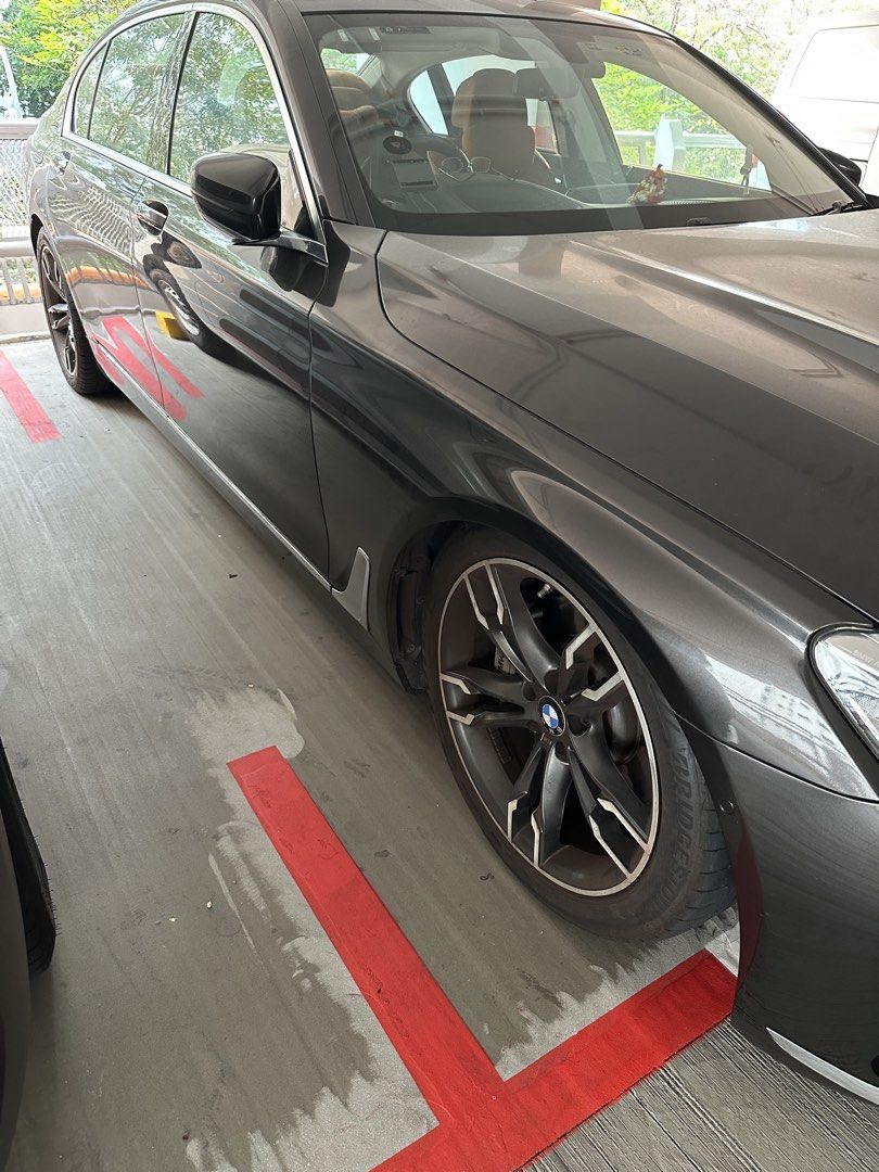 BMW 7 Series 730Li Design Pure Excellence (A) (Category: Used Cars) located in Singapore. Submitted by daringraj (Listing ID 1468403353, Image 1). Description: Dark grey BMW 730 luxury sedan. Spacious cabin featuring premium tan leather seats, rear air conditioning vents, and digital display screen. Distinctive alloy rims fitted with Bridgestone tyres. Classic kidney front grille and sleek silhouette. Well-maintained bodywork and clean interior s