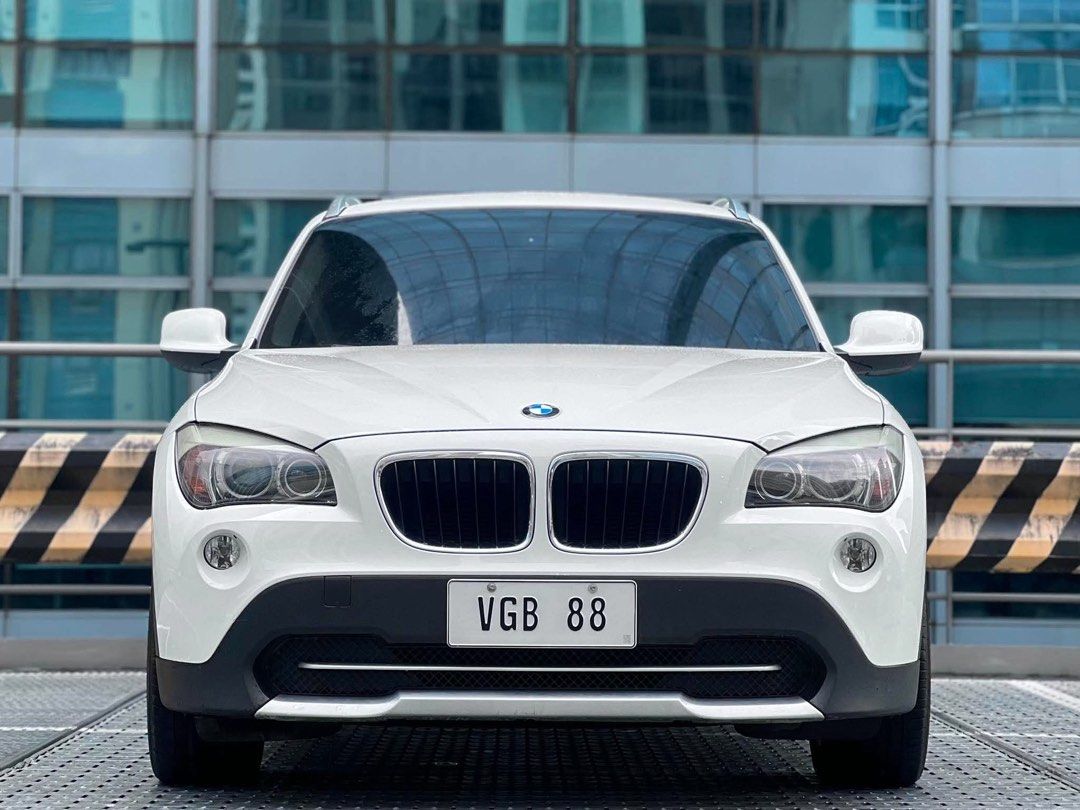 BMW X1 sDrive18i (A) (Category: Used Cars) located in Makati City. Submitted by maby_latido05 (Listing ID 1468342095, Image 1). Description: New unit 🚩 2011 BMW X1 sDrive18i AT Gas‼️🔥 Financing ALL IN Promo: Cash Out: 229K 2 yrs : Php 18,551 ✅ 51K mileage only ✅ Maintained at German Motors ✅ Updated PMS August 2026 ✅ Original Paint ✅ With Manual, Service Booklet & Spare Keys FREE Transfer of Ownership FREE Full Detailing FREE OBD Scan ✅ Highlig