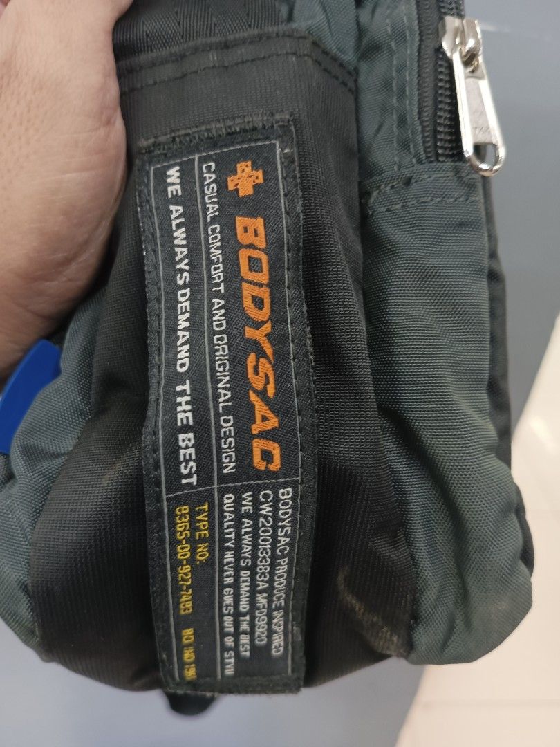 Bodysac Sling Bag (Category: Sling Bags) located in Quezon City. Submitted by arvietekto (Listing ID 1468364659, Image 3). Description: - Brand/Style: Authentic Bodysac classic utility shoulder bag - Color: black adjustable strap - Hardware: Branded metal buckle on the strap and model patch (CW20013383A MFD 9920) - Material: Tough, durable fabric built for everyday wear - Organization: Multiple zippered compartments and plenty of pockets for your