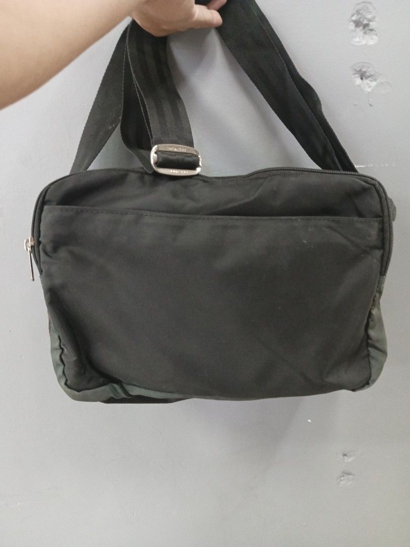 Bodysac Sling Bag (Category: Sling Bags) located in Quezon City. Submitted by arvietekto (Listing ID 1468364659, Image 2). Description: - Brand/Style: Authentic Bodysac classic utility shoulder bag - Color: black adjustable strap - Hardware: Branded metal buckle on the strap and model patch (CW20013383A MFD 9920) - Material: Tough, durable fabric built for everyday wear - Organization: Multiple zippered compartments and plenty of pockets for your
