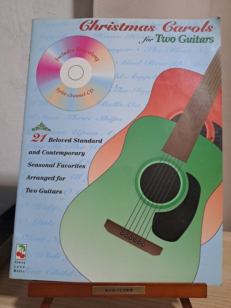Book Christmas Carols for Two Guitars (Category: Assessment Books) located in Las Pinas. Submitted by cobieshop (Listing ID 1468444387, Image 1). Description: Title: Book Christmas Carols for Two Guitars Publisher: Cherry Lane Music Contents: 21 Christmas carols and seasonal favorites Includes: Split-channel play-along CD (Note:WITHOUT THE CD) Arrangement: Two guitars Ideal for guitar players, music students, collectors, and anyone who enjoys pla