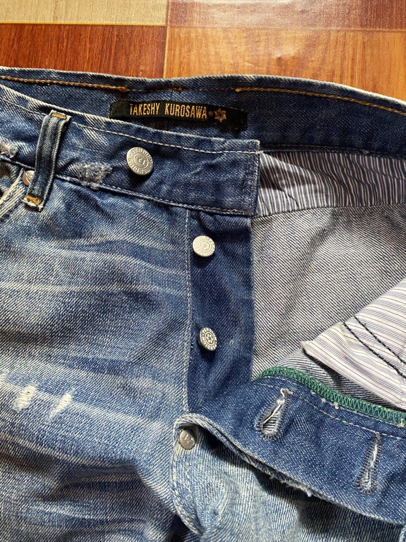 Bootcut Jeans (Category: Jeans) located in General Santos City (Dadiangas). Submitted by versatile__ (Listing ID 1468330776, Image 3). Description: Takeshy Kurosawa - Regular Bootcut Jeans Waist : 28 inches Length : 40 inches Thigh : 12.5 inches Hem : 9.5 inches Good Condition- Nine out Ten Color Rate featuring two botton fly - good fade on front part also the scratch design on front and back pocket -heelbite -need wash +Shipping Fee.