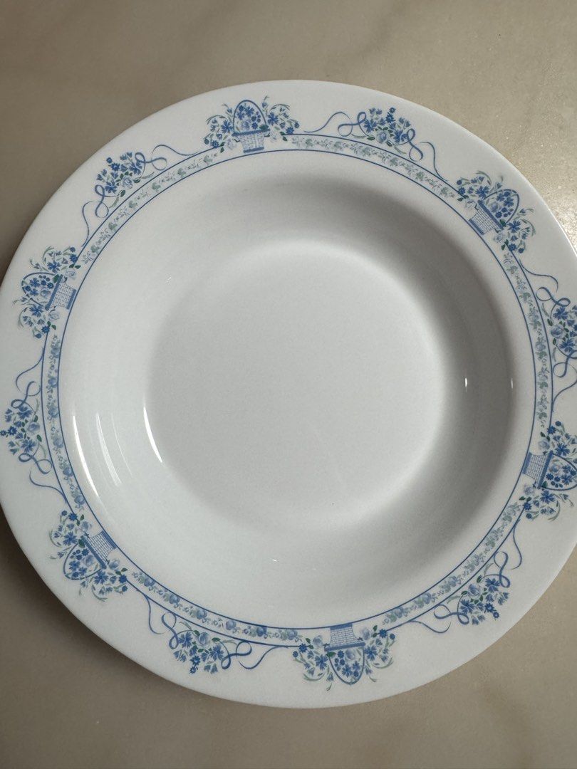 Bormioli Rocco Danubio Collection (Category: Dinnerware & Cutlery) located in Paranaque City. Submitted by tripleddd151025 (Listing ID 1468300331, Image 1). Description: 1 pc Pasta Big Bowl 4 pcs dinner plate 3 pcs breakfast plate 5 pcs serving bowl 8 pcs soup bowl 6 pcs cup and saucer - Matching white porcelain dinnerware set with blue floral basket and ribbon pattern - Includes dinner plates, soup bowls, small plates, cups, and saucers - Timele