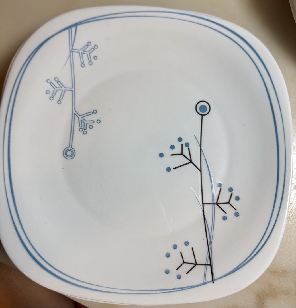 Bormioli Rocco Dinner ware (Category: Dinnerware & Cutlery) located in Paranaque City. Submitted by tripleddd151025 (Listing ID 1468299410, Image 2). Description: 5 pcs square serving bowl 12 pcs square dinner plate - Design: White square plate with a stylish blue outer line border - Accent: Minimalist black and blue branch and dot illustrations - Finish: Smooth, high-quality glazed finish - Usage: Versatile for everyday meals or serving snacks -
