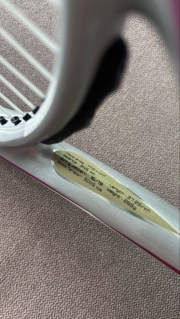 Bridgestone Dual Coil 2.65 Tennis Racket (Category: Racket and Ball Sports) located in Manila. Submitted by shopgirl17 (Listing ID 1468330558, Image 2). Description: Bridgestone Dual Coil 2.65 Tennis Racket - Like New - Face area - 110inch - Balance - 345mm - String pattern - 16/19 - Rcmd tension - 50 - Length - 27.25 inch - Weight - 265g.