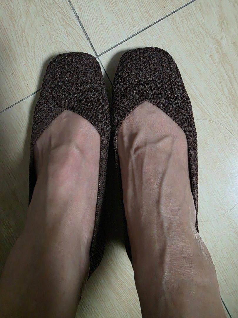 Brown Knit Square Toe Flat Shoes (Category: Flats & Sandals) located in Makati City. Submitted by shopdoc (Listing ID 1468394122, Image 2). Description: - Color: Dark brown with beige inner sole - Style: Slip-on knit flats with square toes - Comfort: Super flexible and breathable mesh design - Features: Neat stitching and reinforced heel tab - Condition: Like new, perfect for daily wear.