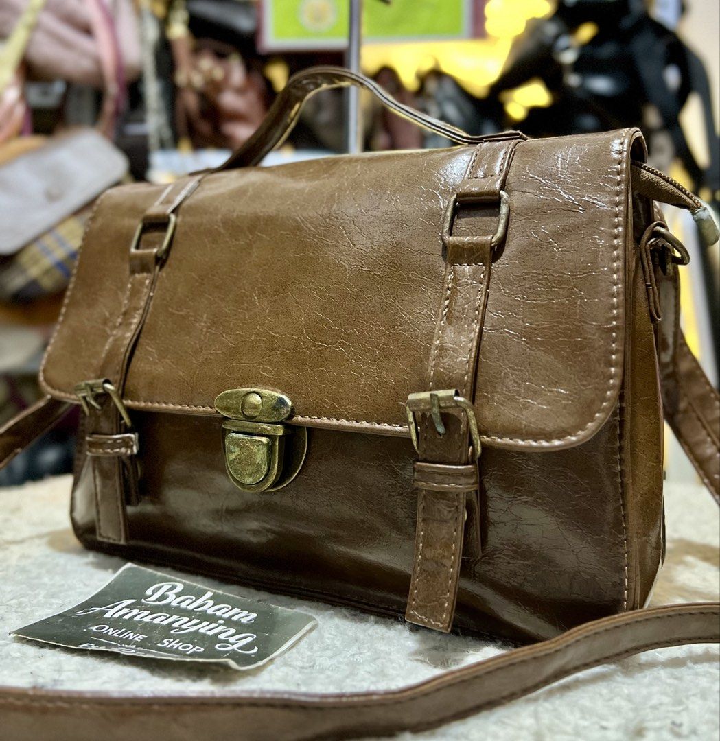 Brown Messenger Bag for Men (Category: Sling Bags) located in Rizal. Submitted by babamamanyingonlineshop (Listing ID 1468348482, Image 2). Description: .
