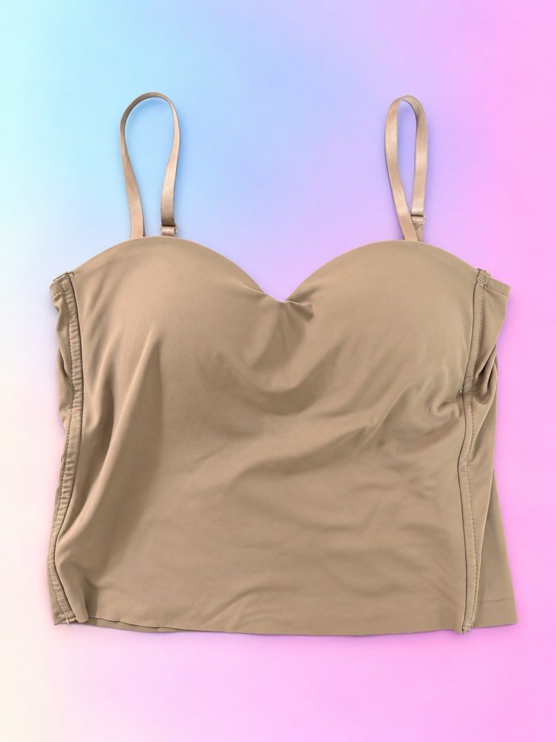 Brown Padded Camisole Top with Adjustable Straps (Category: Sleeveless) located in Quezon City. Submitted by turtleandfishes (Listing ID 1468316398, Image 1). Description: - Color: Brown - Style: Camisole top with built-in padded cups - Straps: Thin, adjustable shoulder straps with a straight back design - Material: Smooth, stretchy fabric for a comfortable fit - Measurements: 14" across the chest, 12" length from top of cup to hem - Condition: C