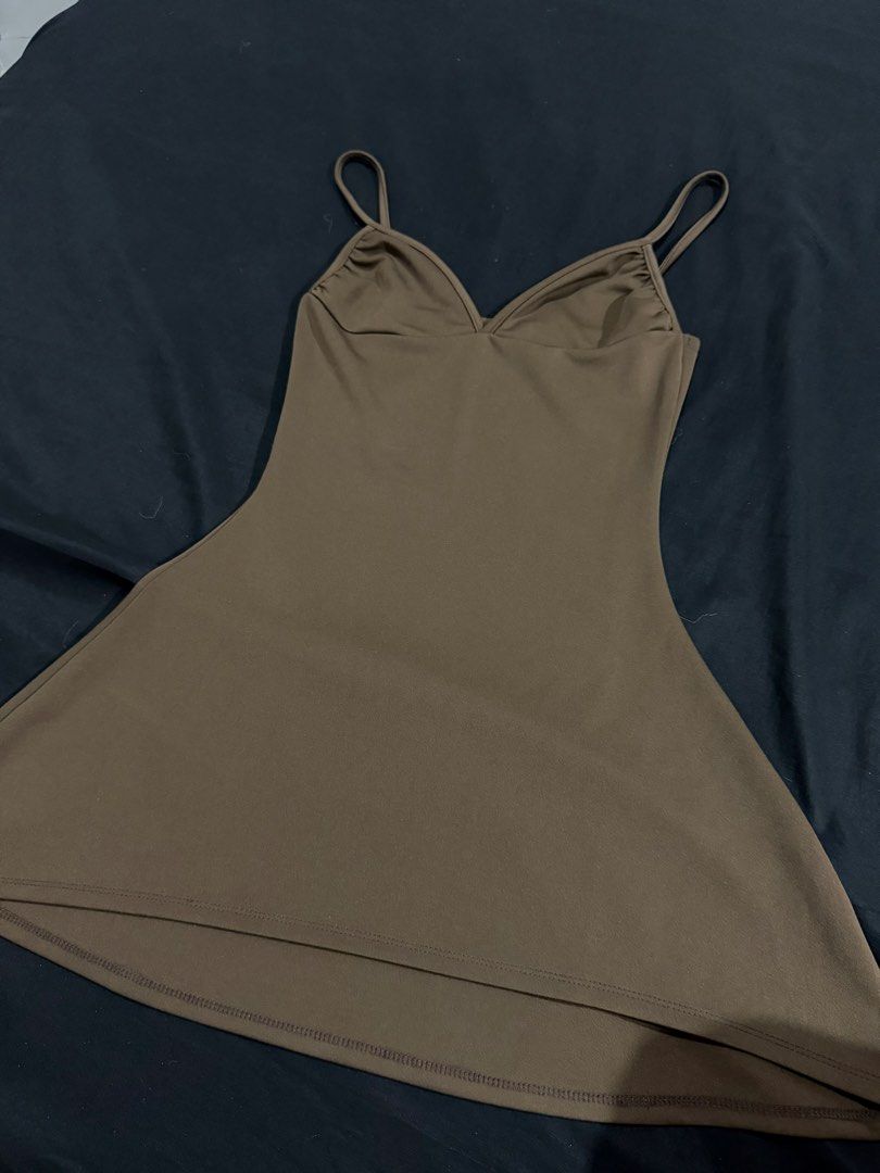 Brown Spaghetti Strap Mini Dress (Category: Dresses) located in Manila. Submitted by mdncy (Listing ID 1468458662, Image 1). Description: Cute and flattering brown mini dress, perfect for casual outings, dates, and vacations. Simple, classy, and easy to style! Condition: Pre-loved.