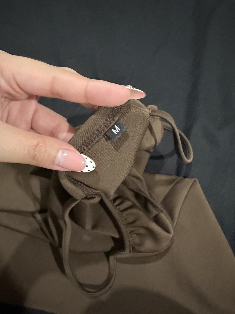 Brown Spaghetti Strap Mini Dress (Category: Dresses) located in Manila. Submitted by mdncy (Listing ID 1468458662, Image 3). Description: Cute and flattering brown mini dress, perfect for casual outings, dates, and vacations. Simple, classy, and easy to style! Condition: Pre-loved.