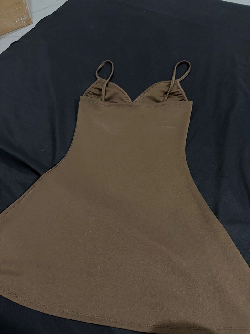 Brown Spaghetti Strap Mini Dress (Category: Dresses) located in Manila. Submitted by mdncy (Listing ID 1468458662, Image 2). Description: Cute and flattering brown mini dress, perfect for casual outings, dates, and vacations. Simple, classy, and easy to style! Condition: Pre-loved.