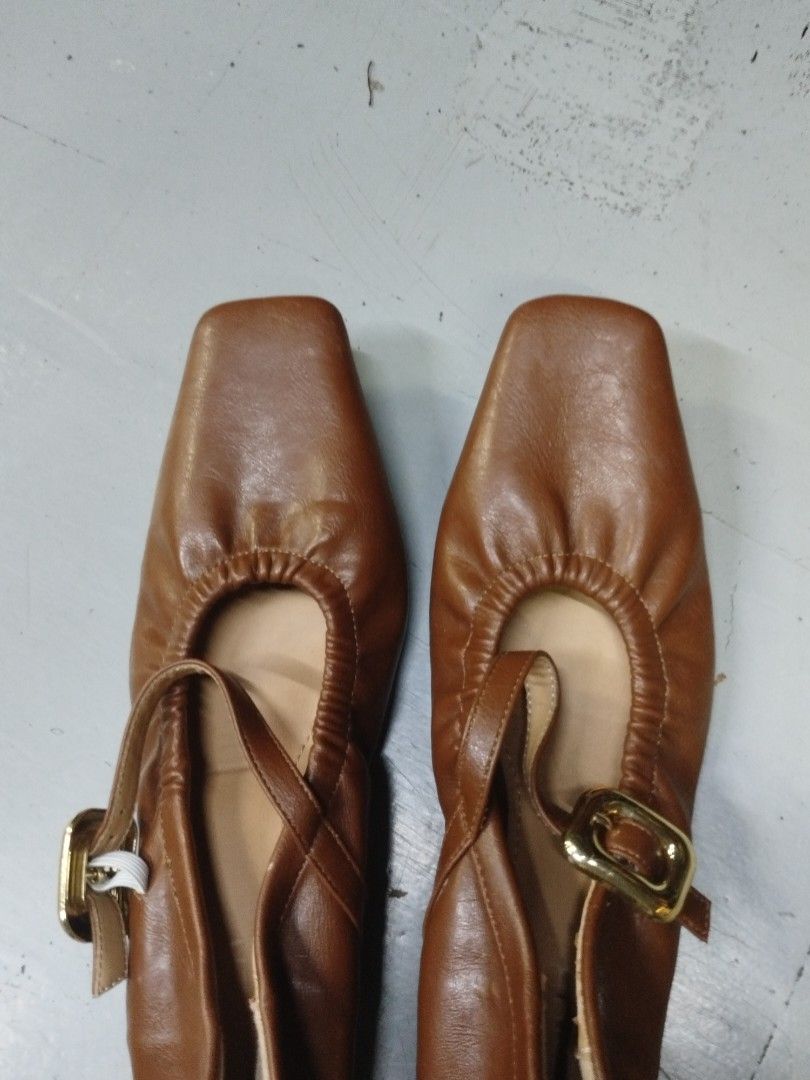 Brown Square Toe Ballet Flats with Buckle (Category: Flats & Sandals) located in Quezon City. Submitted by cuteitemsonlyyy (Listing ID 1468416805, Image 2). Description: - Color: Tan brown - Toe Design: Chic square toe - Fit & Details: Elasticated collar with a crossover ankle strap and gold-tone buckle hardware - Interior: Light tan lining - Condition: Clean uppers and soles showing minimal handling, like new.