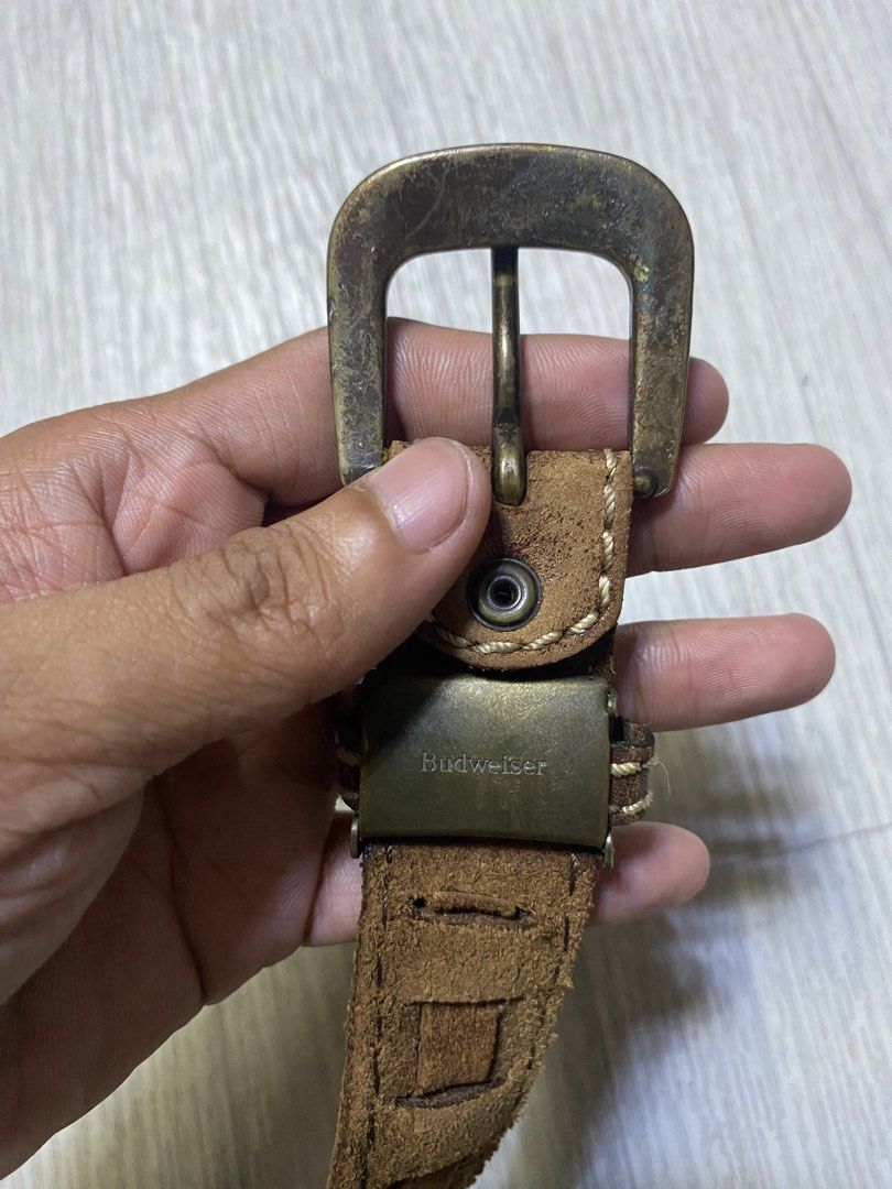 Budweiser Vintage Leather Belt (Category: Belts) located in Pasig City. Submitted by terrencec34805 (Listing ID 1468475456, Image 2). Description: Budweiser vintage Brown leather with brass buckle Floral engraving on the buckle with woven cut-out strap details In good condition Size:Fit to 34-38.