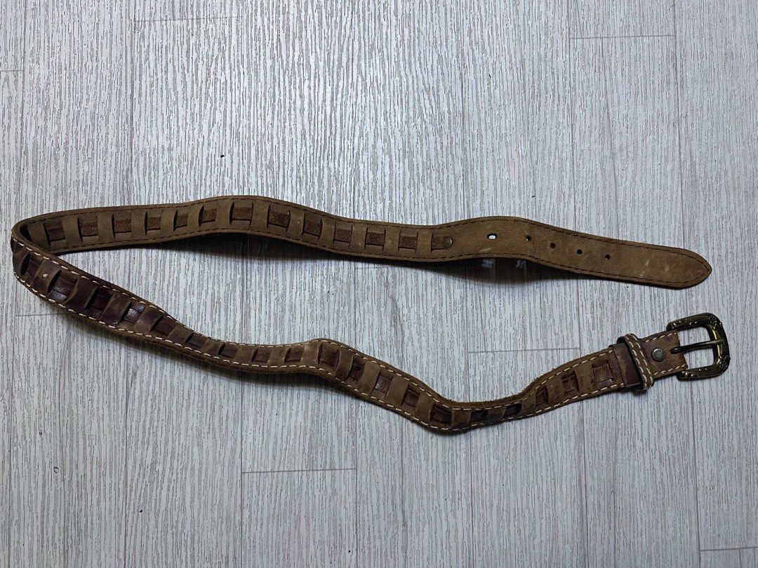 Budweiser Vintage Leather Belt (Category: Belts) located in Pasig City. Submitted by terrencec34805 (Listing ID 1468475456, Image 3). Description: Budweiser vintage Brown leather with brass buckle Floral engraving on the buckle with woven cut-out strap details In good condition Size:Fit to 34-38.