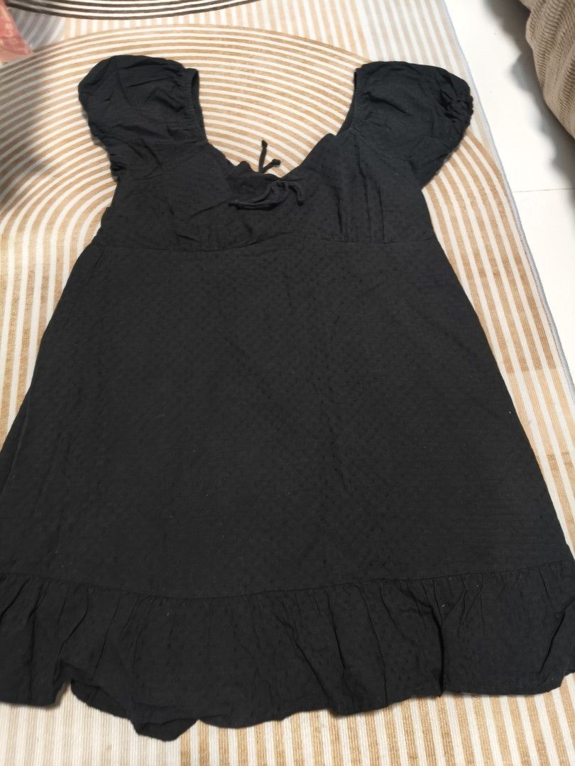 Bundle of 3 Floral and Solid Black Dresses (Category: Dresses) located in Valenzuela. Submitted by purpleubangtan (Listing ID 1468336870, Image 3). Description: - Bundle of 3 stylish dresses - Dress 1: Dark blue long-sleeve dress with yellow and white floral print - Dress 2: Black short-sleeve wrap dress with red floral print and ruffled hem - Dress 3: Solid black short-sleeve dress with Swiss dot texture, tie-front neckline, and ruffled hem - Al